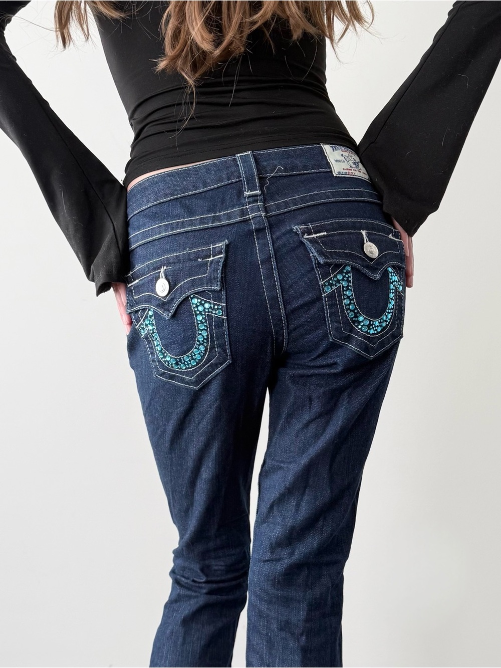 True religion dark wash mid rise bootcut jeans.